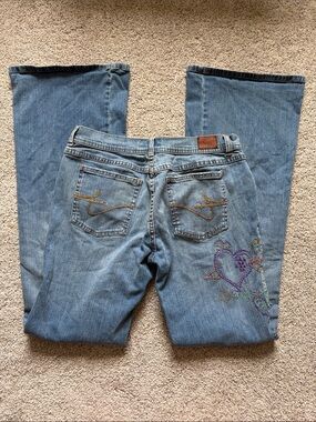 VTG Tommy Jeans Y2K Boho Hippy Heart Embroidered Flare Jeans Medium Wash 26x31